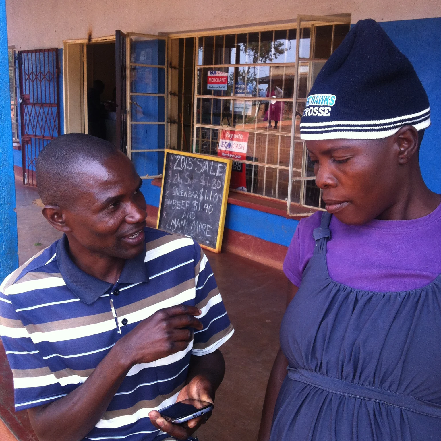 Enumerator conducting a mobile questionnaire survey in Mutasa, Zimbabwe